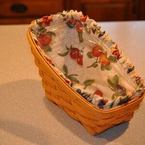 Longaberger angled basket with plastic protector and fabric liner.